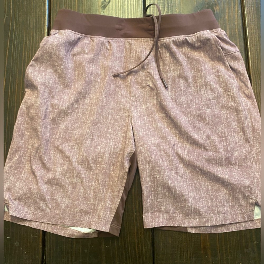 Lululemon T.H.E short. Size L. Liner-less 9”. Zipped back pocket. Purple